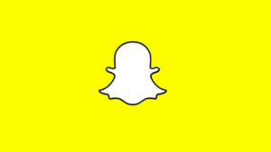 The snapchat logo on a yellow background.