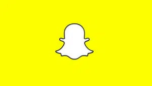 The snapchat logo on a yellow background.