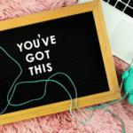 you've got this letter board on pink carpet