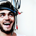 A man with wires on his head.