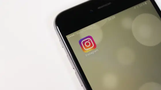 A smartphone with an instagram logo on it.
