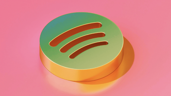 Spotify logo on a pink background.