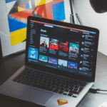 A laptop on a desk.