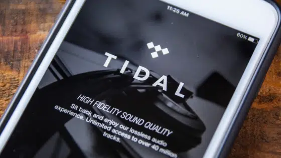 The tidal app is displayed on a phone.