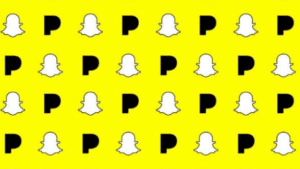 A pattern of black and white snaps on a yellow background.