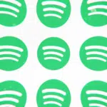 A group of green spotify logos on a white background.