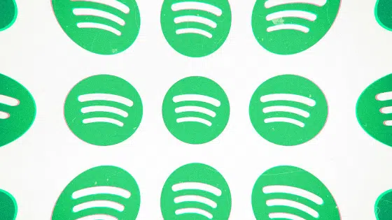 A group of green spotify logos on a white background.