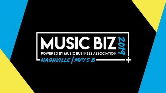 Music biz logo on a blue and yellow background.