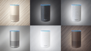 Four different colors of the amazon echo speaker.