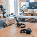 Two microphones on a table in an office.