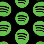 A green spotify logo on a black background.