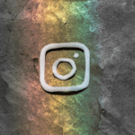 An instagram logo on a concrete wall.