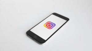 A smartphone with an instagram logo on it.