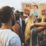 A crowd of people at a music festival.