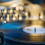 A dj is playing music on a turntable.