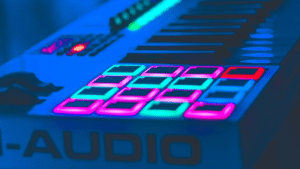 A close up of a keyboard with colorful lights on it.