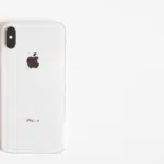 An iphone xr on a white surface.