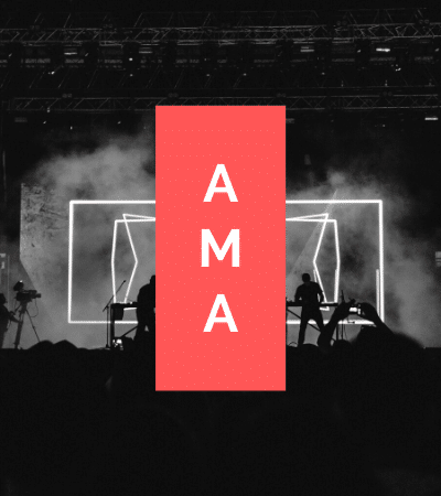 A black and white image of a concert with the words ama.