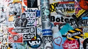 A wall adorned with trademark stickers.