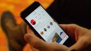 A person showcasing Instagram Reels on their cell phone.