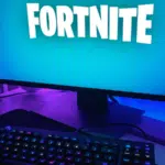 Keywords: video gaming

Modified Description: A computer screen displaying the popular video game Fortnite.