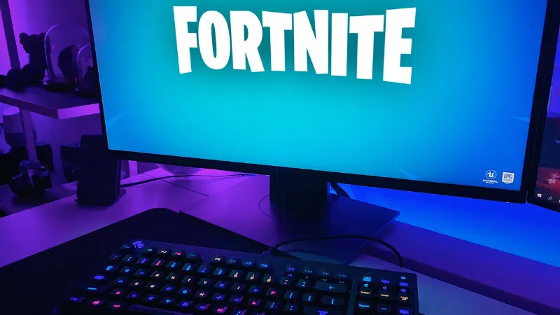 Keywords: video gaming

Modified Description: A computer screen displaying the popular video game Fortnite.