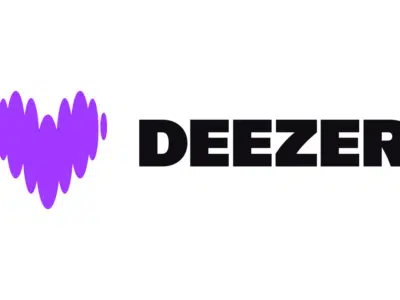 An eye-catching purple soundwave heart pulses vibrantly beside "DEEZER" in bold black capital letters, set against a crisp white background.