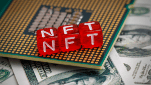 A CPU stacked with money featuring the word NFT.