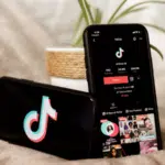 A phone with a TikTok app for analytics.