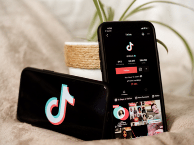 A phone with a TikTok app for analytics.