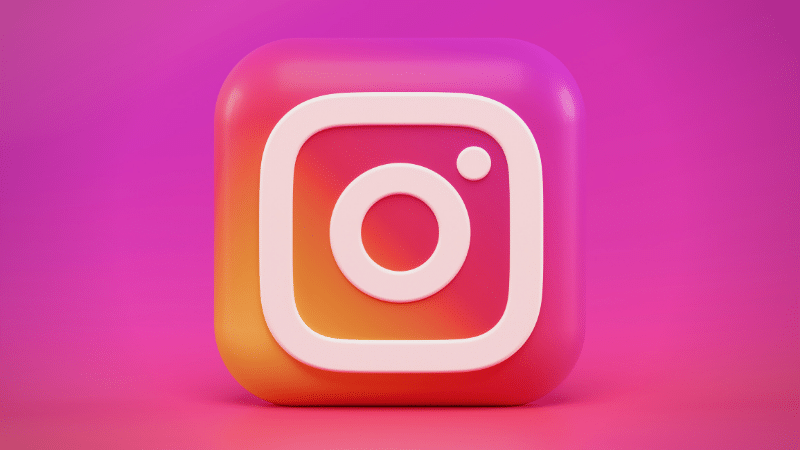 An Instagram icon on a pink background, following best practices.