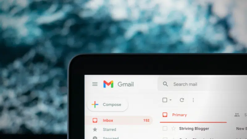 Gmail displaying email marketing campaigns on a laptop screen.