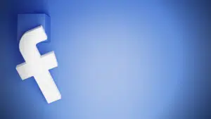 Facebook logo on a blue background.