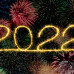 Symphonic’s Year in Review: 2022 captures the essence of the word 2020, depicted on a black background accompanied by dazzling fireworks.