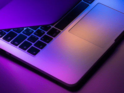 A laptop with purple and blue lights on it designed for social media enthusiasts.