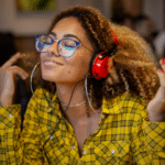 A young woman with headphones in a women-owned restaurant.