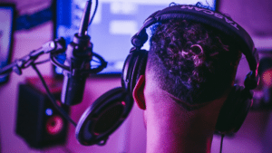 A person wearing headphones in a Tidal recording studio.