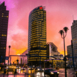 A city at dusk with Reeperbahn Festival buildings in the background.