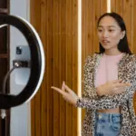 girl making a video with a ring light for tiktok