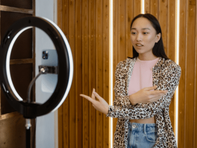 girl making a video with a ring light for tiktok