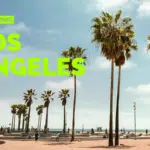 Amidst the palm trees and sunbathers at a vibrant beach, "Symphonic Los Angeles" stands out in bold green text, capturing the city's harmonious blend of culture and nature.