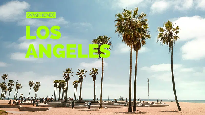 Amidst the palm trees and sunbathers at a vibrant beach, "Symphonic Los Angeles" stands out in bold green text, capturing the city's harmonious blend of culture and nature.