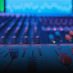 Close-up of a sound mixing board with sliders and knobs, enhanced by AI mastering. Blurred colorful lights dance in the background, adding vibrancy to the scene.