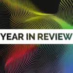 A vibrant abstract background with swirling lines sets the stage, highlighted by the text "Year in Review" elegantly placed on a crisp white rectangle.