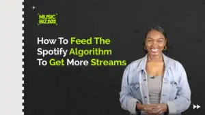 A person smiling in front of a black background with text: "How To Feed The Spotify Algorithm To Get More Streams and maximize your Spotify success.