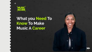 A smiling person in a black jacket stands beside text reading "What You Need To Know To Make Music A Career," featuring the 'Music Biz 101' logo. Dive into the music biz and turn your passion into a sustainable career.