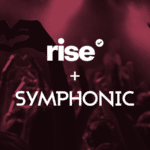 Silhouetted crowd with raised hands at a concert. Text overlay reads "rise + SYMPHONIC" with a checkmark symbol near "rise.