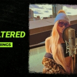 A woman with long blonde hair and sunglasses sings into a microphone on a rooftop. Text reads: "Symphonic Unfiltered with Tinywiings.
