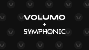 Symphonic Partners with Volumo White text “Volumo + SYMPHONIC” is centered on a black background with a subtle repeating “V” pattern, evoking Volumo’s bold visual identity.