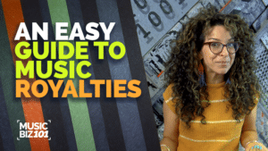 A woman with curly hair stands beside a wall with colorful stripes and text that reads, “An Easy Guide to Music Royalties. Music Biz 101.”.